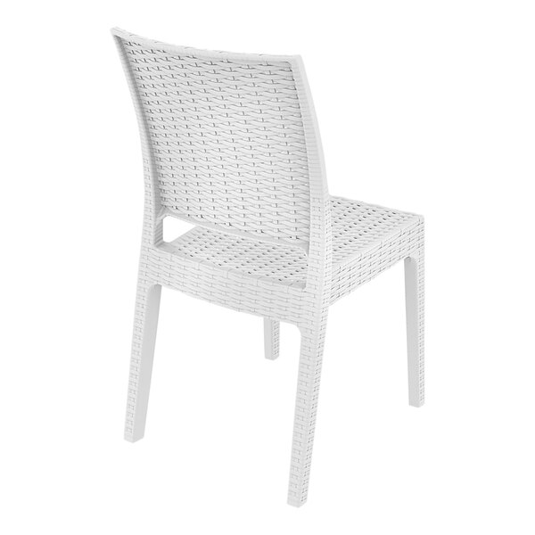 A Siesta Florida white plastic chair with a woven backrest.