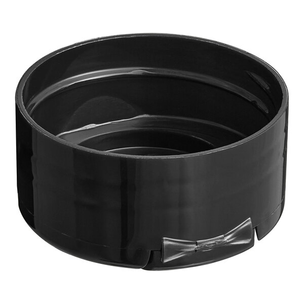 A round black plastic spice container with a black flip and sift lid.