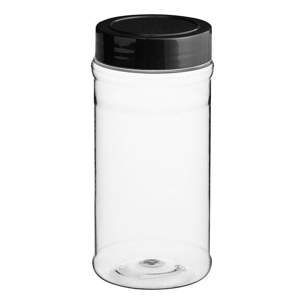 A clear plastic spice container with a black lid.