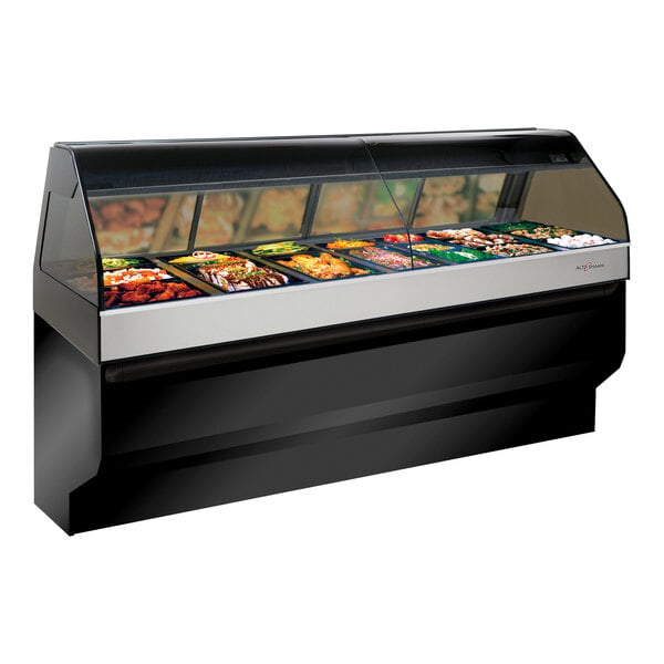 An Alto-Shaam black heated countertop food display case with food on it.