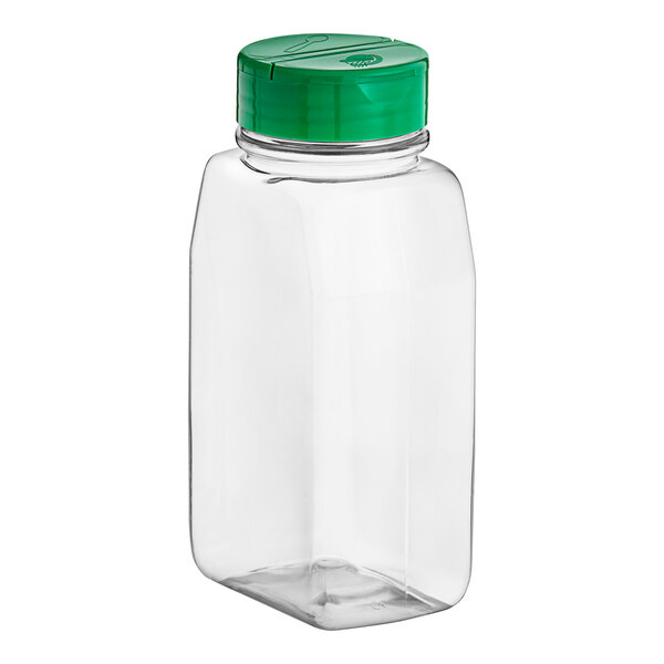 A clear plastic rectangular spice container with a green dual flapper lid with 3 holes.