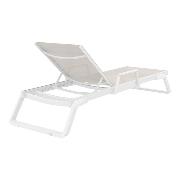 A Siesta Tropic white resin chaise lounge chair with a taupe sling on a white background.