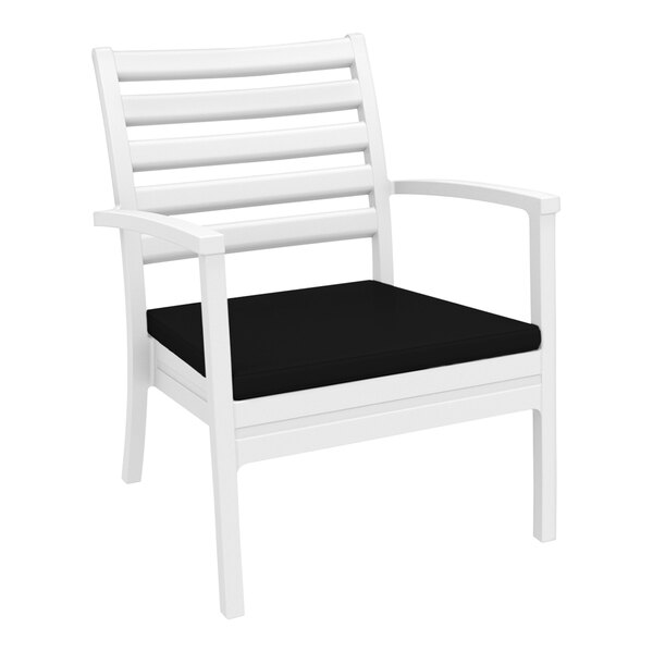 A Siesta Artemis XL white outdoor club arm chair with a black cushion.