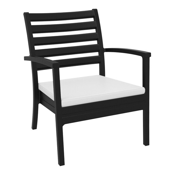 A Siesta Artemis XL black outdoor club arm chair with a white cushion.