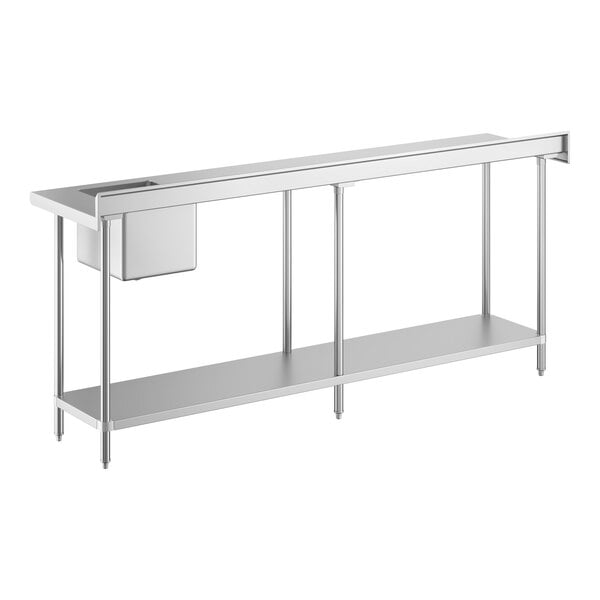 A long stainless steel work table with a sink on the right side and an undershelf.
