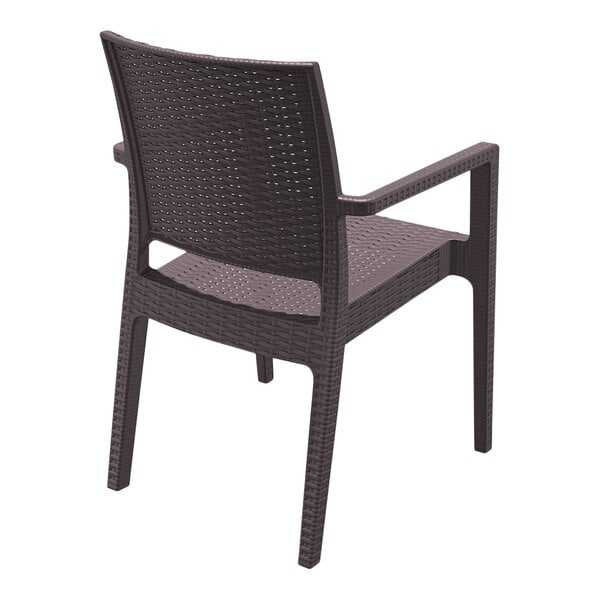 A Siesta Ibiza brown wicker outdoor dining arm chair.