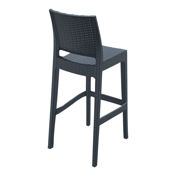 A dark gray Siesta Jamaica wickerlook barstool with a back.