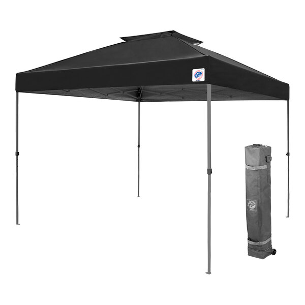 A black E-Z Up canopy tent with a grey frame in a bag with a logo.