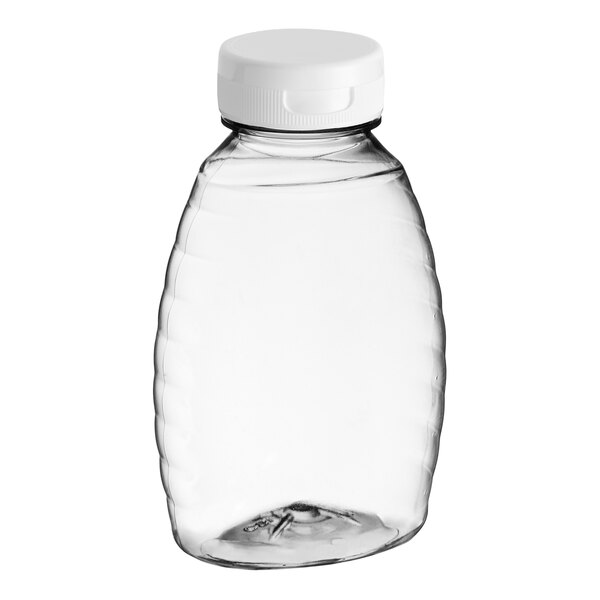 A clear Classic Queenline PET honey bottle with a white flip top lid.