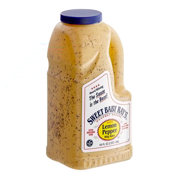 A plastic jug of Sweet Baby Ray's Lemon Pepper Wing Sauce.