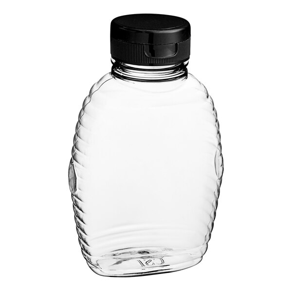 A clear plastic bottle with a black lid.