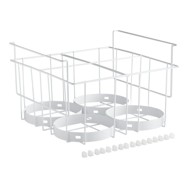 A white wire rack with four circular holes.