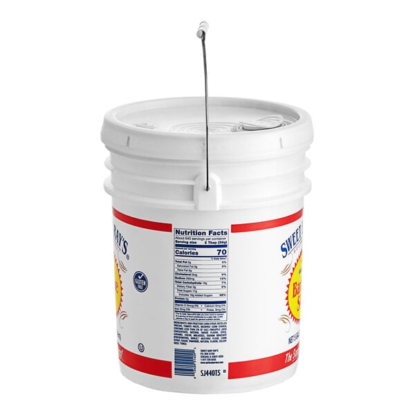 A white bucket with a label and a handle containing Sweet Baby Ray's Original BBQ Sauce.