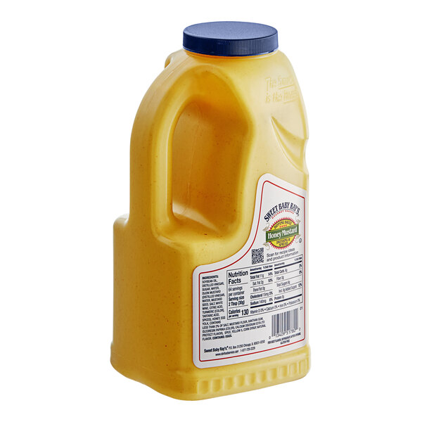 A yellow bottle of Sweet Baby Ray's Honey Mustard Dipping Sauce on a white background.