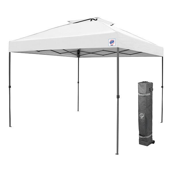A white E-Z Up tent with a grey cover and bag.