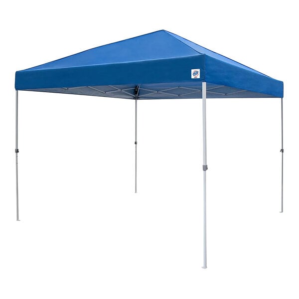 A royal blue E-Z Up canopy tent with a white frame.