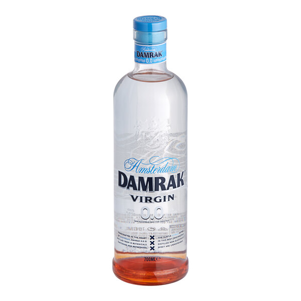 A close up of a clear Damrak Virgin Non-Alcoholic Gin bottle filled with clear liquid.