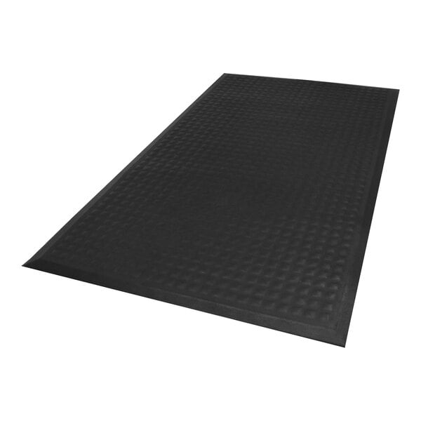 A black Complete Comfort II mat with a square design.