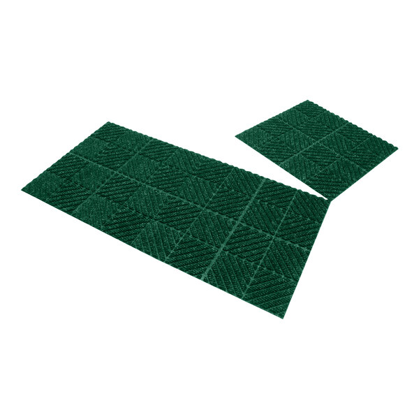 Two green WaterHog Max mat tiles with a square pattern.