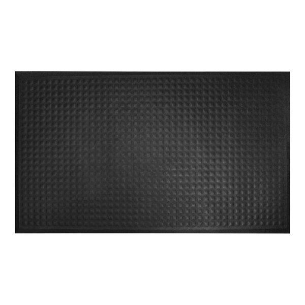 A close-up of a black rectangular mat with a diamond pattern.