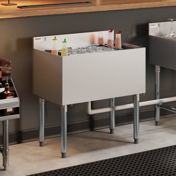 Regency IB1830 18" x 30" Stainless Steel Underbar Ice Bin with Bottle Holders - 98 lb.