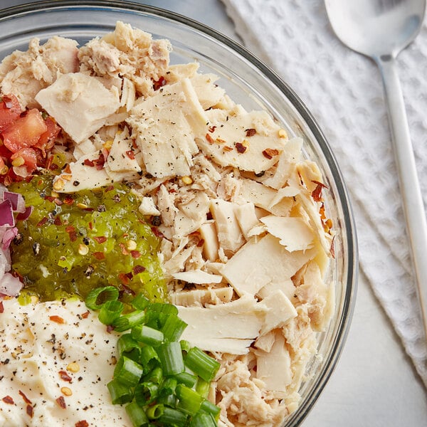 A bowl of Sea Tales Albacore Tuna in water.