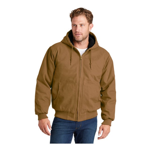 A man wearing a brown CornerStone hooded work jacket.
