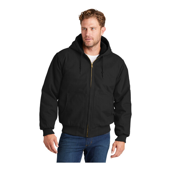 A man wearing a CornerStone black hooded work jacket.