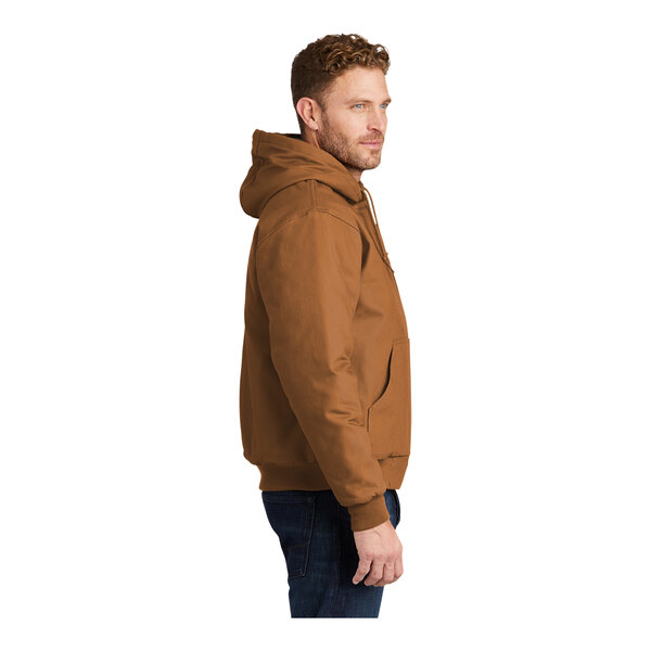 A man in a CornerStone duck brown hooded work jacket.