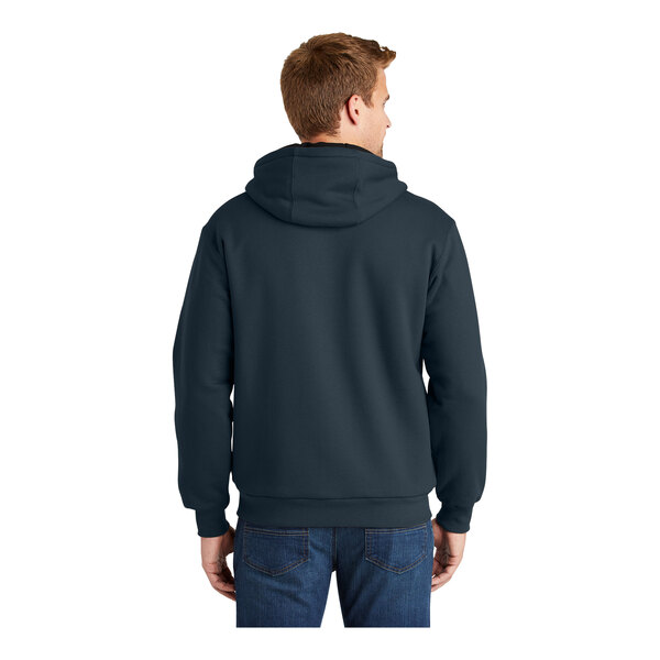A man wearing a navy CornerStone heavy weight thermal lined hoodie.