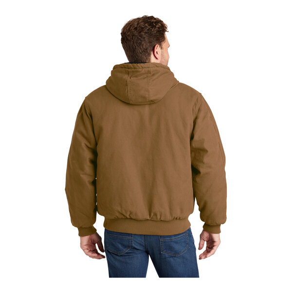 A man wearing a CornerStone brown hooded work jacket.
