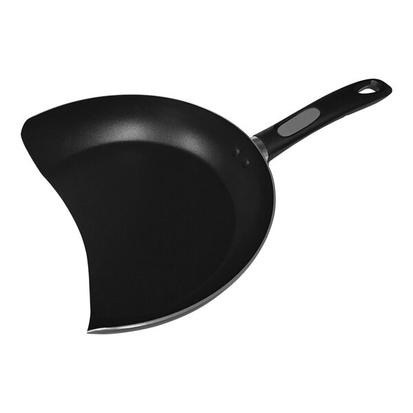 A black pan with a handle.