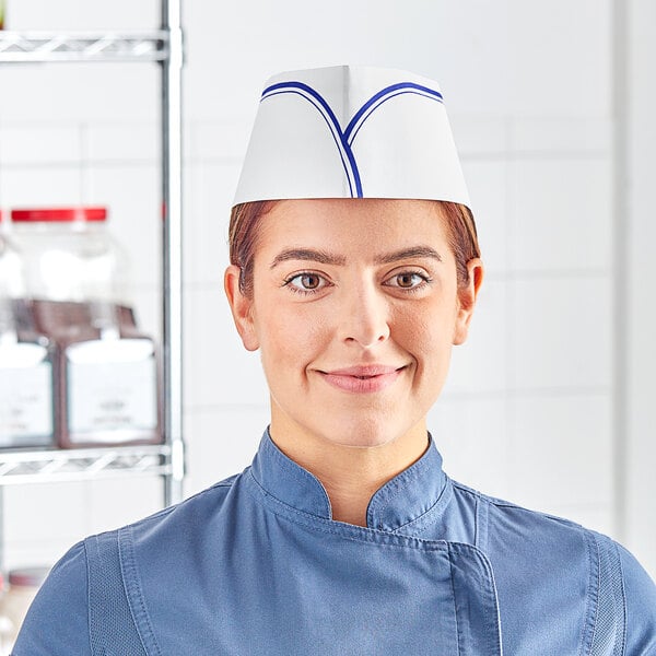 A woman wearing a blue and white Choice adjustable disposable overseas cap.