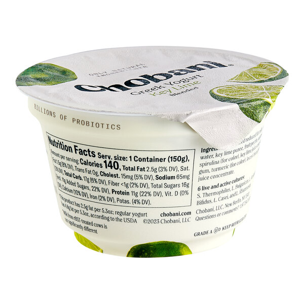A white Chobani container of low-fat Key Lime Greek yogurt with a lid.