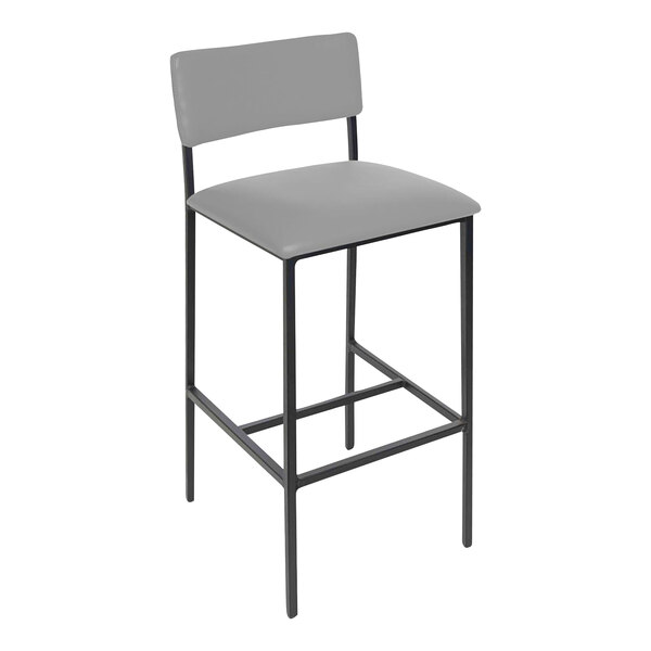 A BFM Seating black steel counter height barstool with a gray vinyl seat and back.