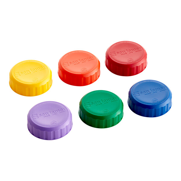A set of six San Jamar assorted color plastic bottle caps.