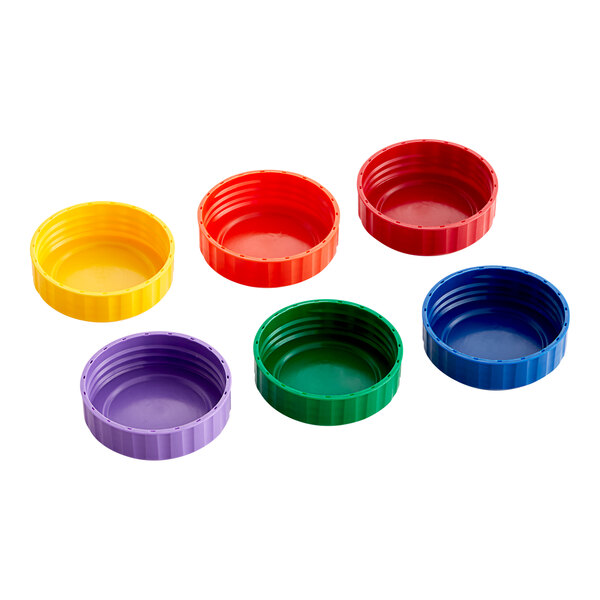 A set of six San Jamar plastic bottle caps in assorted colors.