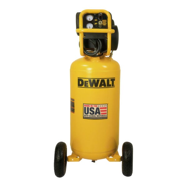 A yellow DeWalt air compressor with black lettering and wheels.