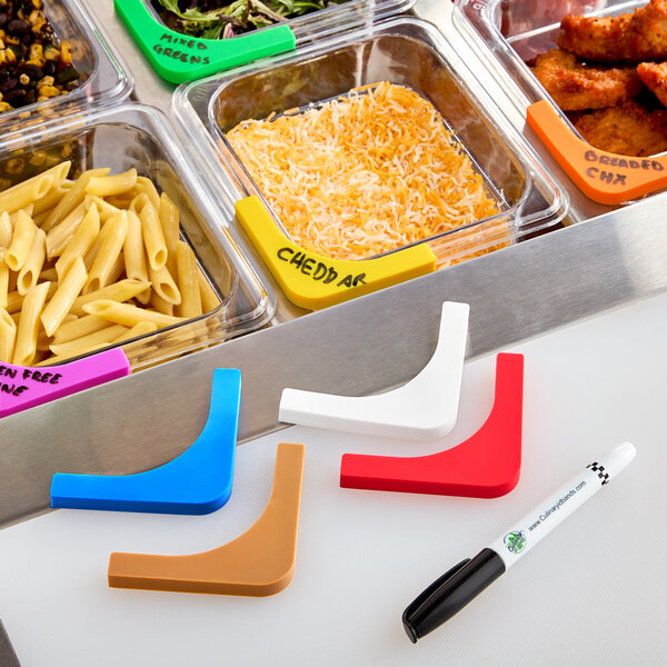 A red triangle label with "blank" written on it next to a black and white marker.