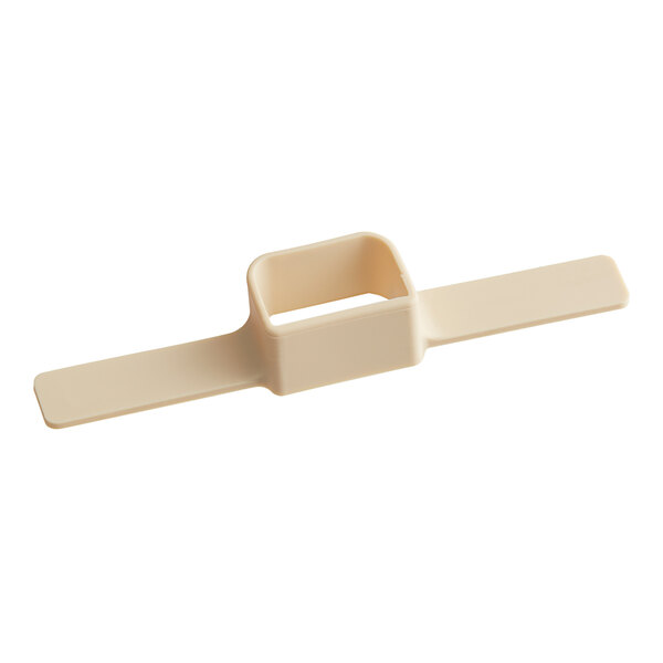 A white plastic Vigor Blank Write-On Label with a square hole.