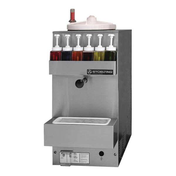 A Stoelting countertop frozen beverage dispenser with colored containers of liquid.