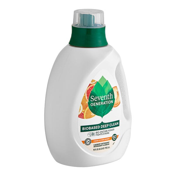 A white bottle of Seventh Generation citrus liquid laundry detergent with a green label and lid.