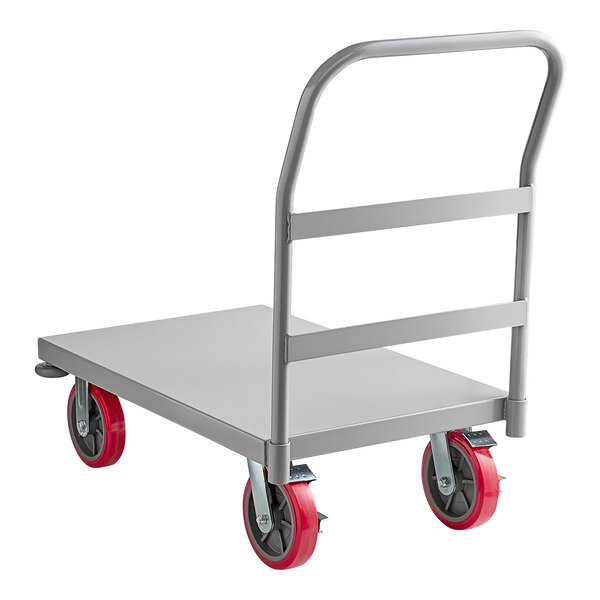 A gray heavy-duty steel platform truck with red wheels.