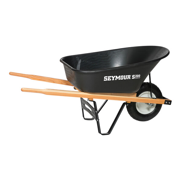 A black Seymour Midwest wheelbarrow with wooden handles.