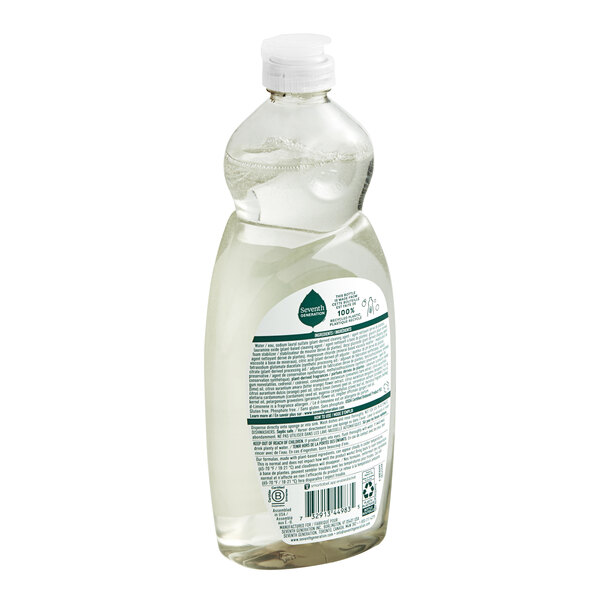 A close-up of a Seventh Generation Fresh Lime and Ginger dish soap bottle with a white label.