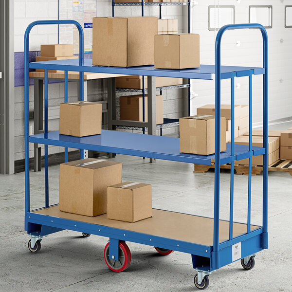 A blue Lavex shelf holding a box on a U-Boat utility cart.