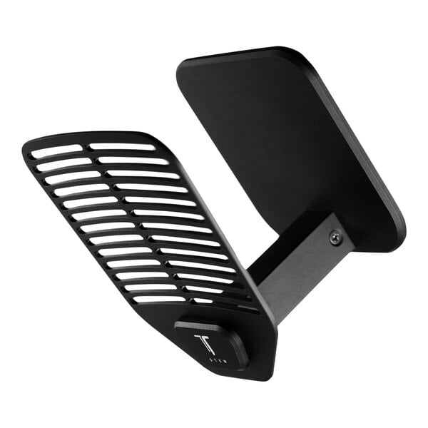 A black Nucleus Coffee Tools coffee cup stand with a metal grate.