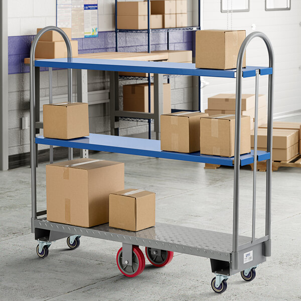 A brown box on a blue Lavex shelf attached to a U-boat utility cart.