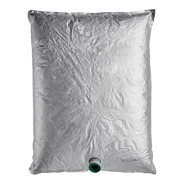 A silver bag of Endless Harvest Mango Aseptic Fruit Puree with a green cap.