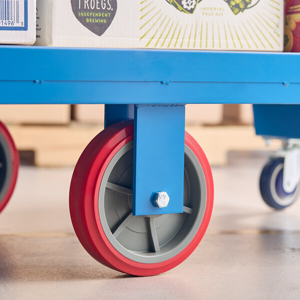 A blue heavy-duty utility cart with a red and gray wheel, designed for transporting goods.